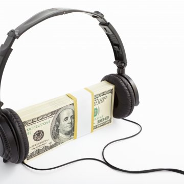black headphones money dollar bills